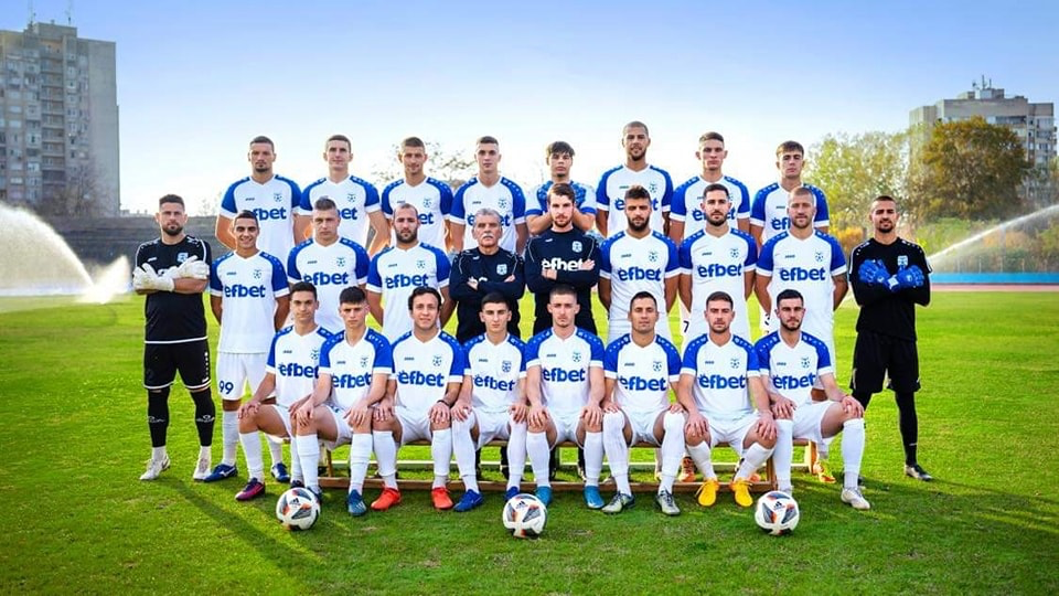 Team in blue and white jerseys